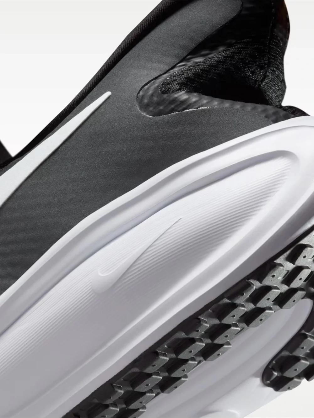 Nike Men’s Black and White Slip-On Running Shoes